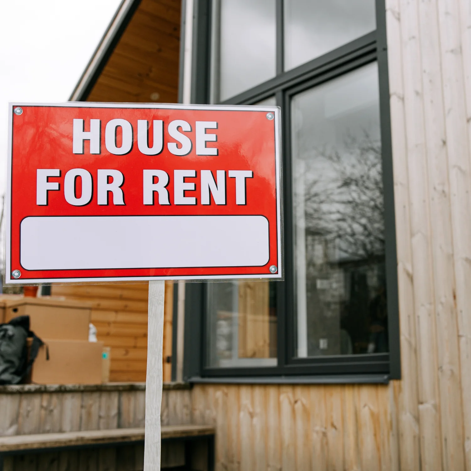 House for rent sign outside a residential property